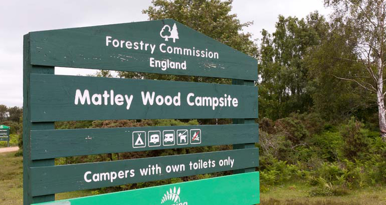 Matley Wood campsite entrance sign in the New Forest.