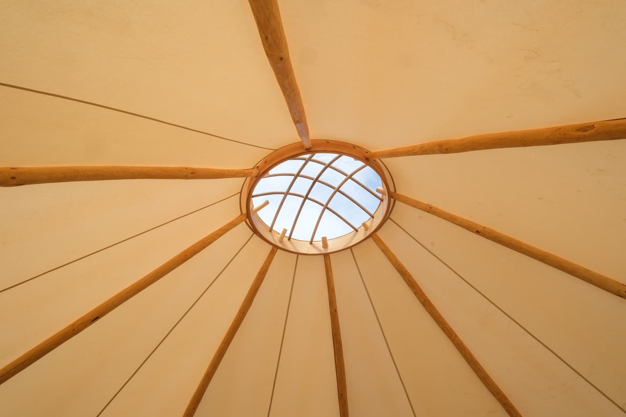 Interior roof of a glamping bell tent with central skylight