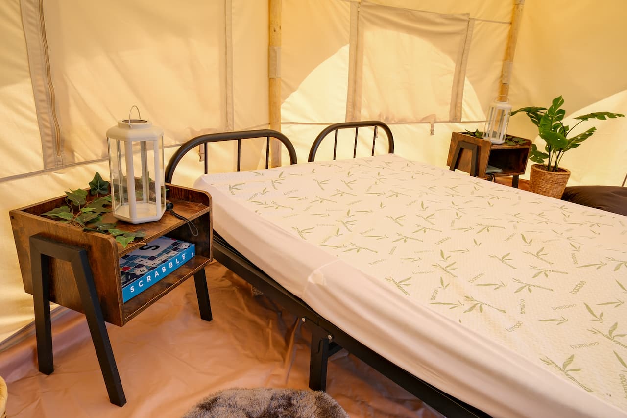 Interior of a Burt glamping tent at Ashurst Campsite